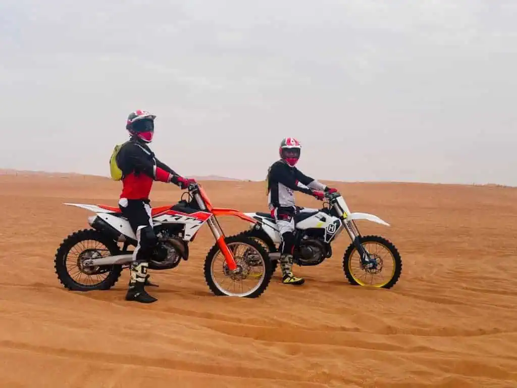 dual dirt bikes in desert